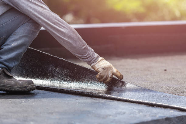 Professional Waterproofing technician working in Newport, MN
